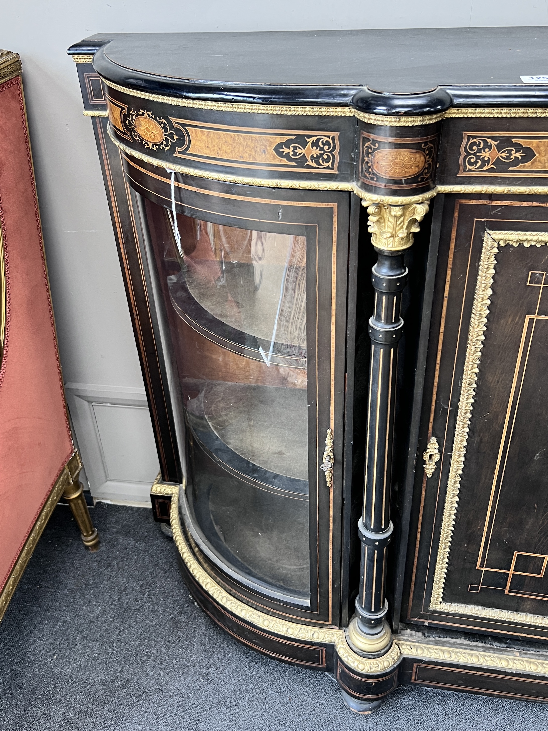 A large ebonised Victorian walnut and ebonised credenza central Sevres style porcelain plaque, width 183cm, height 108cm